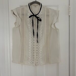 Elegant Cream Sleeveless Blouse with Bow